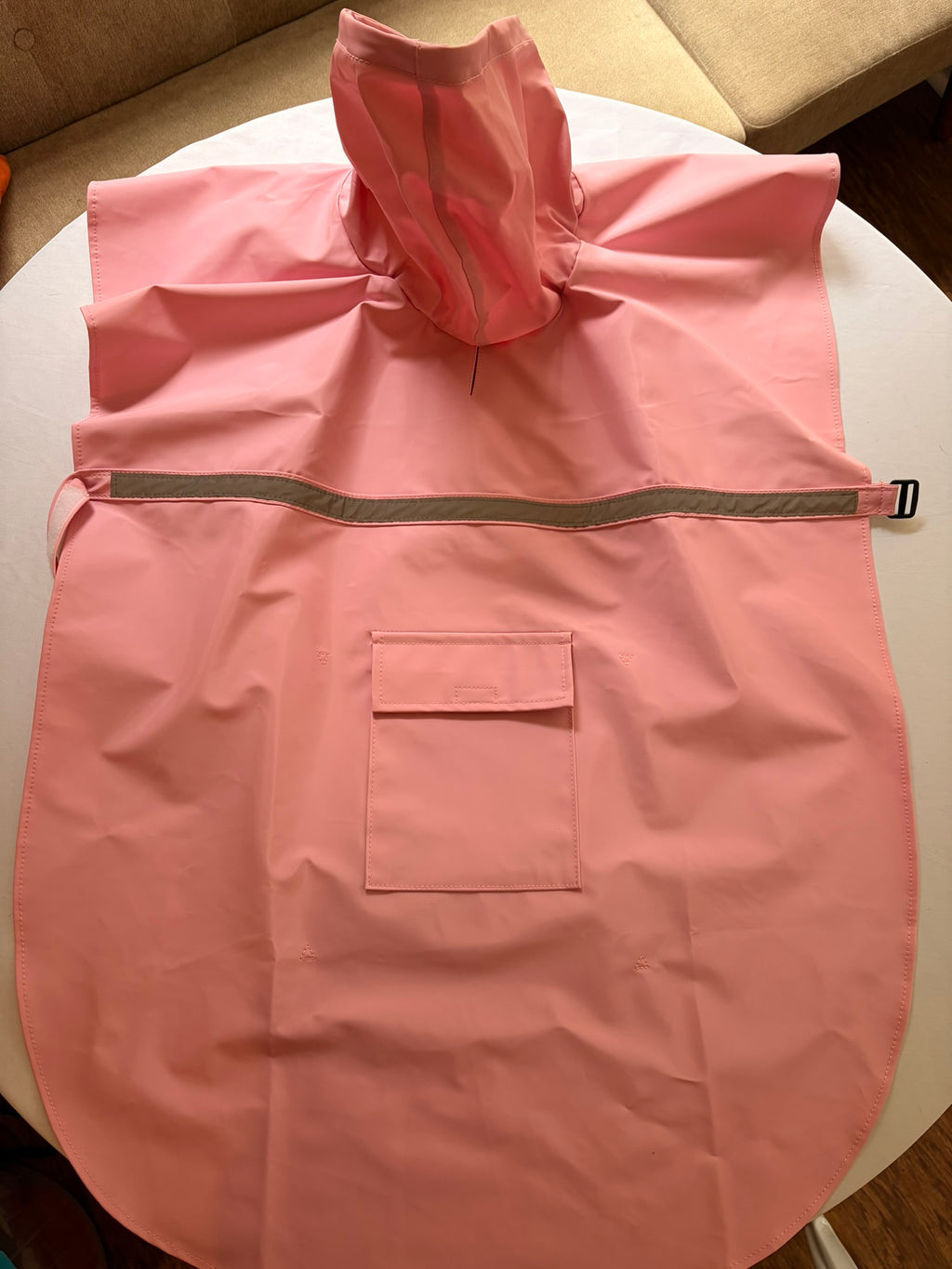 Stella's Iconic Pink Raincoat